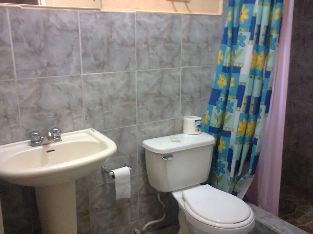 Yard Style Hotel Kingston Quarto foto